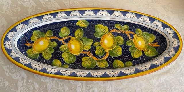 Oval tray 50x20 cm with lemons on a blue background