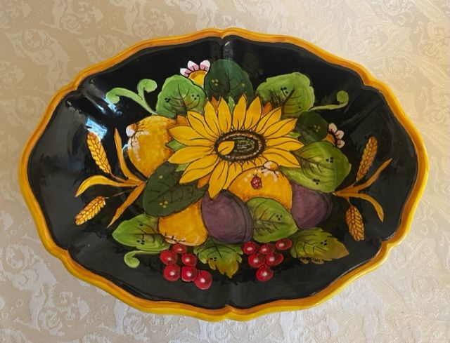 oval bowl 38x28 h8.5 Sunflower, lemons & grapes on a black background