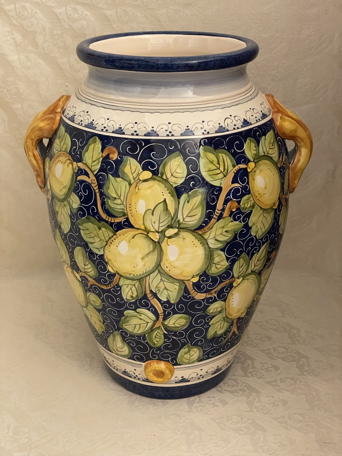 Jar h50 with lemons on blue background