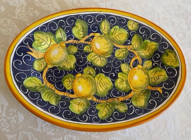 Oval tray 36x26 cm with lemons on a blue background